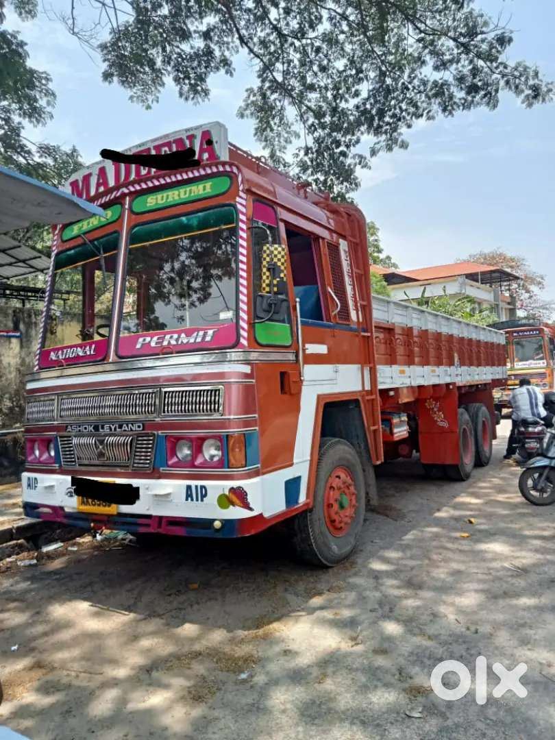 White Kenworth semi truck parked